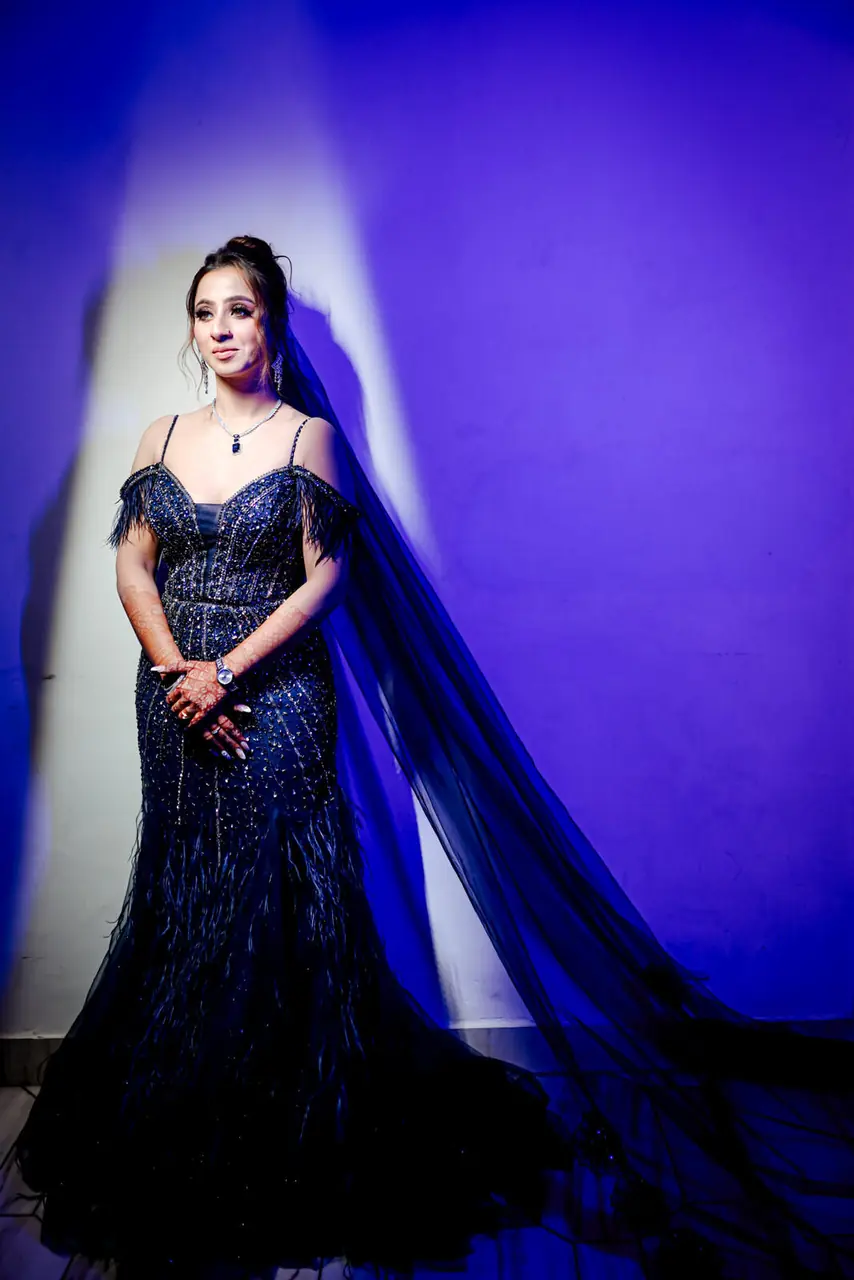 Portrait in a blue-lit studio setup